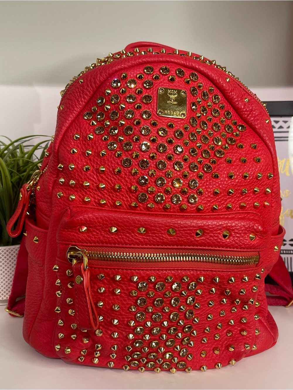MCM Backpack with Gold Studs and Crystal Accents